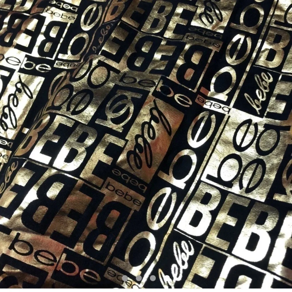 Metallic gold and black bebe babydoll dress​​​​​​​​​​​​​​​​​​​​​​​​ - Picture 4 of 4